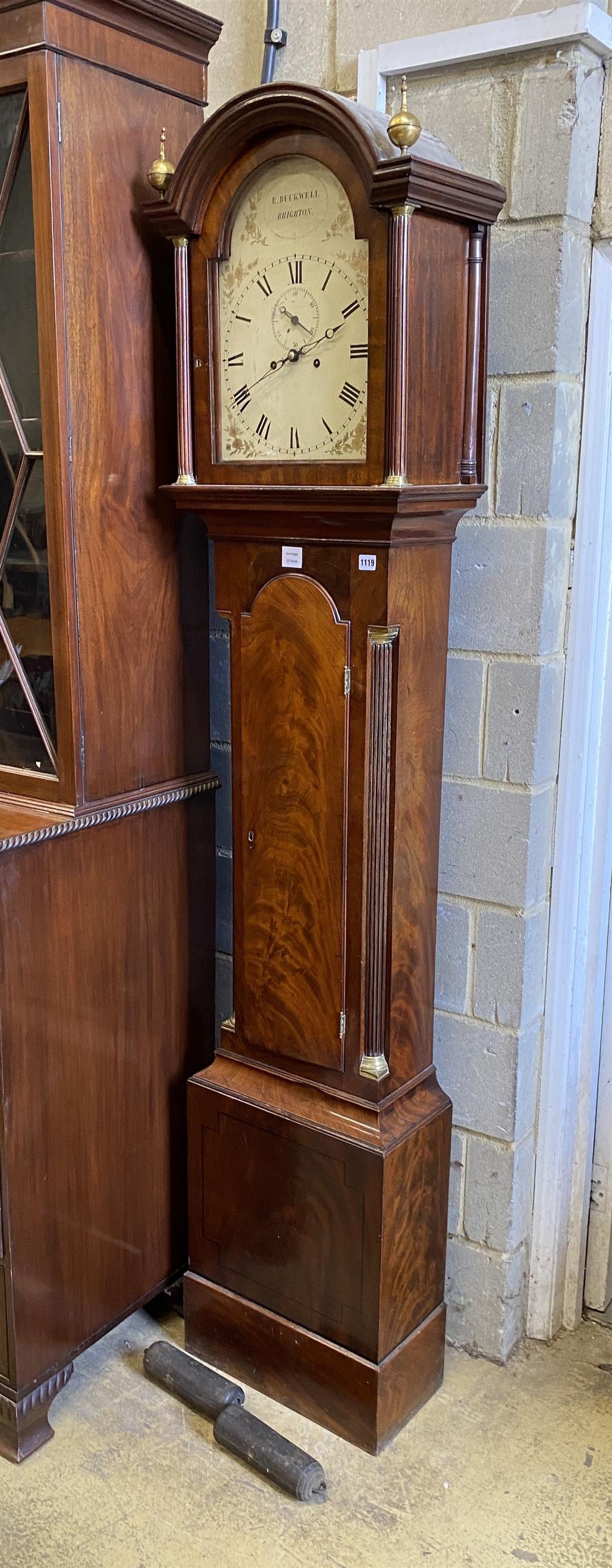 E. Buckwell, Brighton. A late 18th century mahogany eight day longcase clock, with painted arched dial, height 222cm